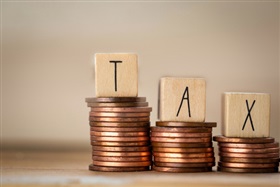 Un modèle de règlement-taxe dans le cadre de la compensation relative au prélèvement kilométrique